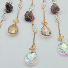 Ophæng med sommerfugle og krystaller