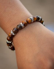 TVILLINGERNE - TIGERØJE ARMBÅND MED RHINSTEN